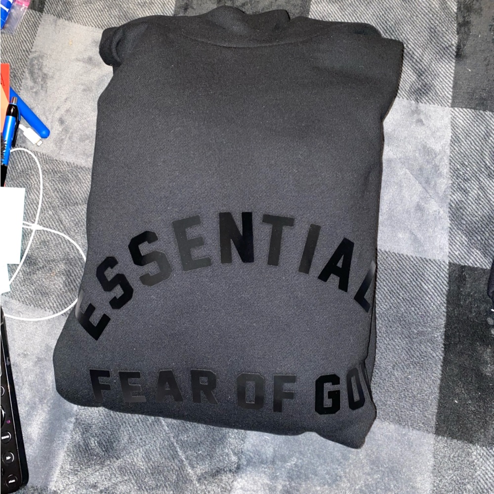 Essentials Fear of God Jet Black Hoodie.